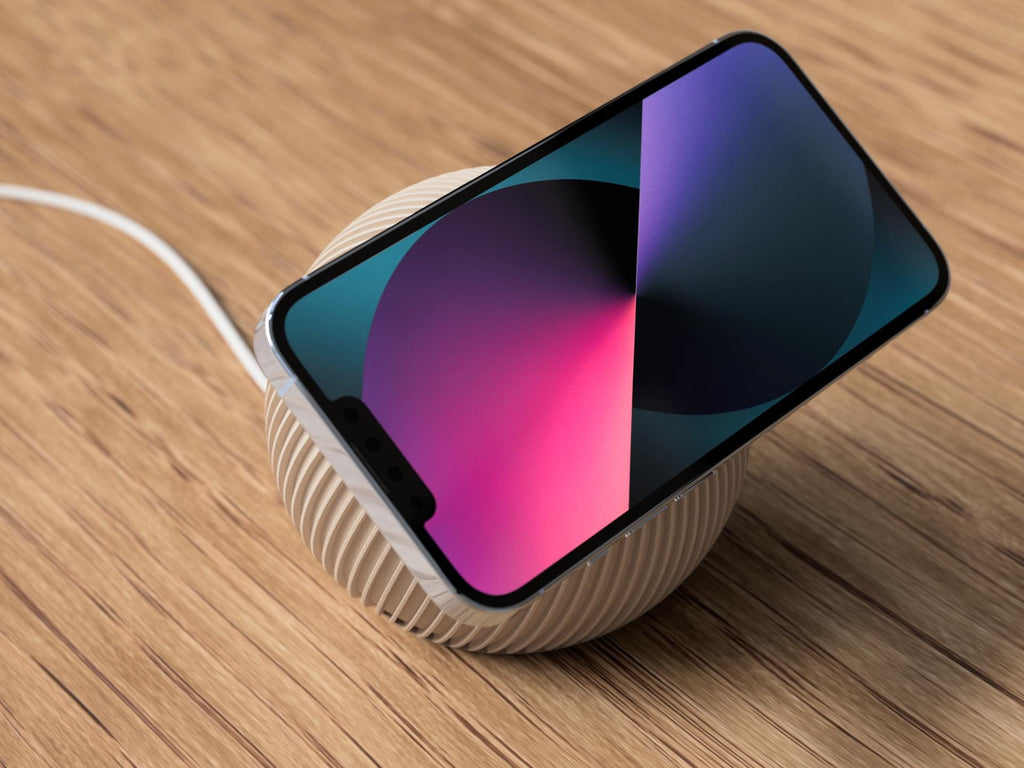 Smartphone with a colorful display on a wooden surface