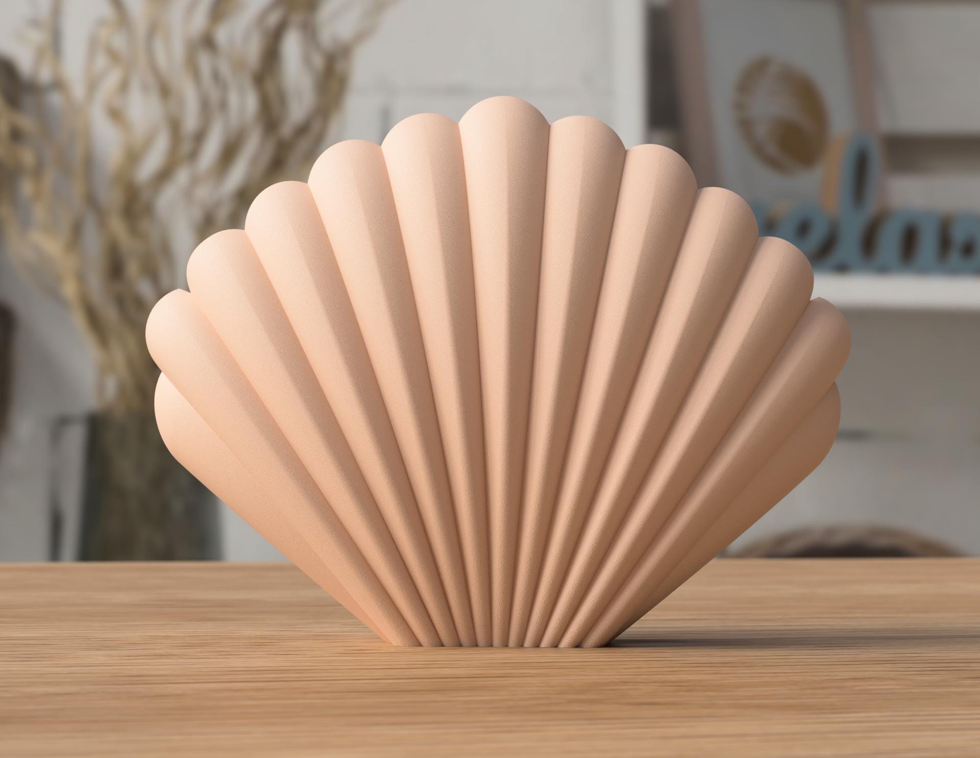 Wooden shell-shaped object on a wooden surface with a blurred background