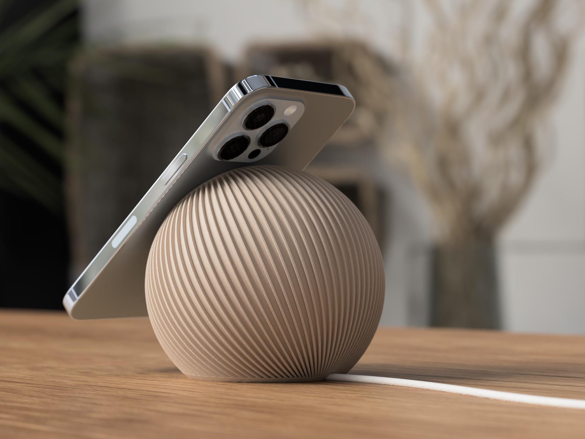 Phone on a textured spherical stand with blurred background