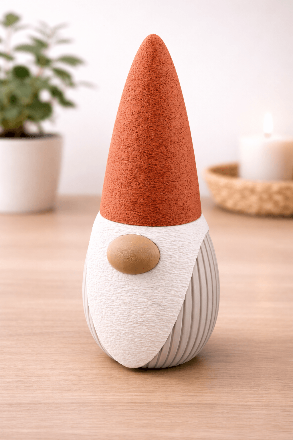 Gnome figurine with a red hat on a wooden surface