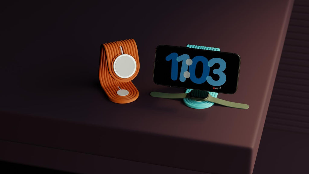 Smartwatch and smartphone on a dark surface with digital clock display.