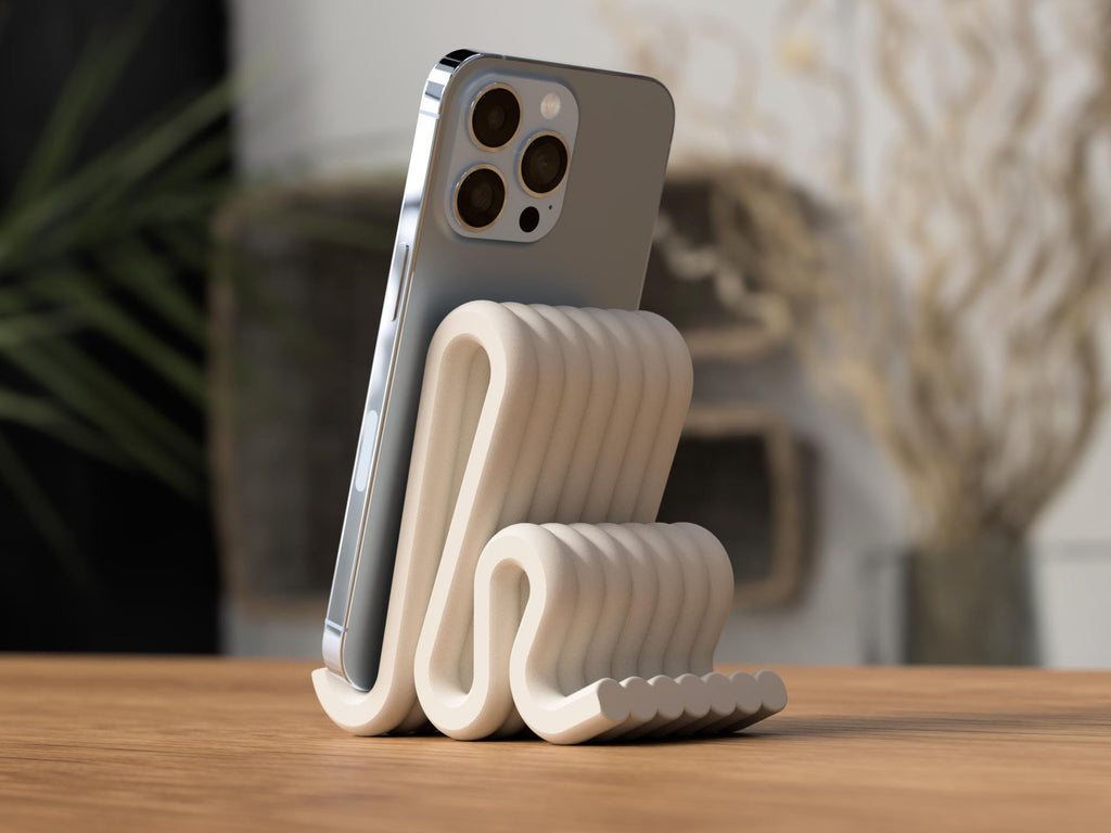 Phone holder with a phone on a wooden surface