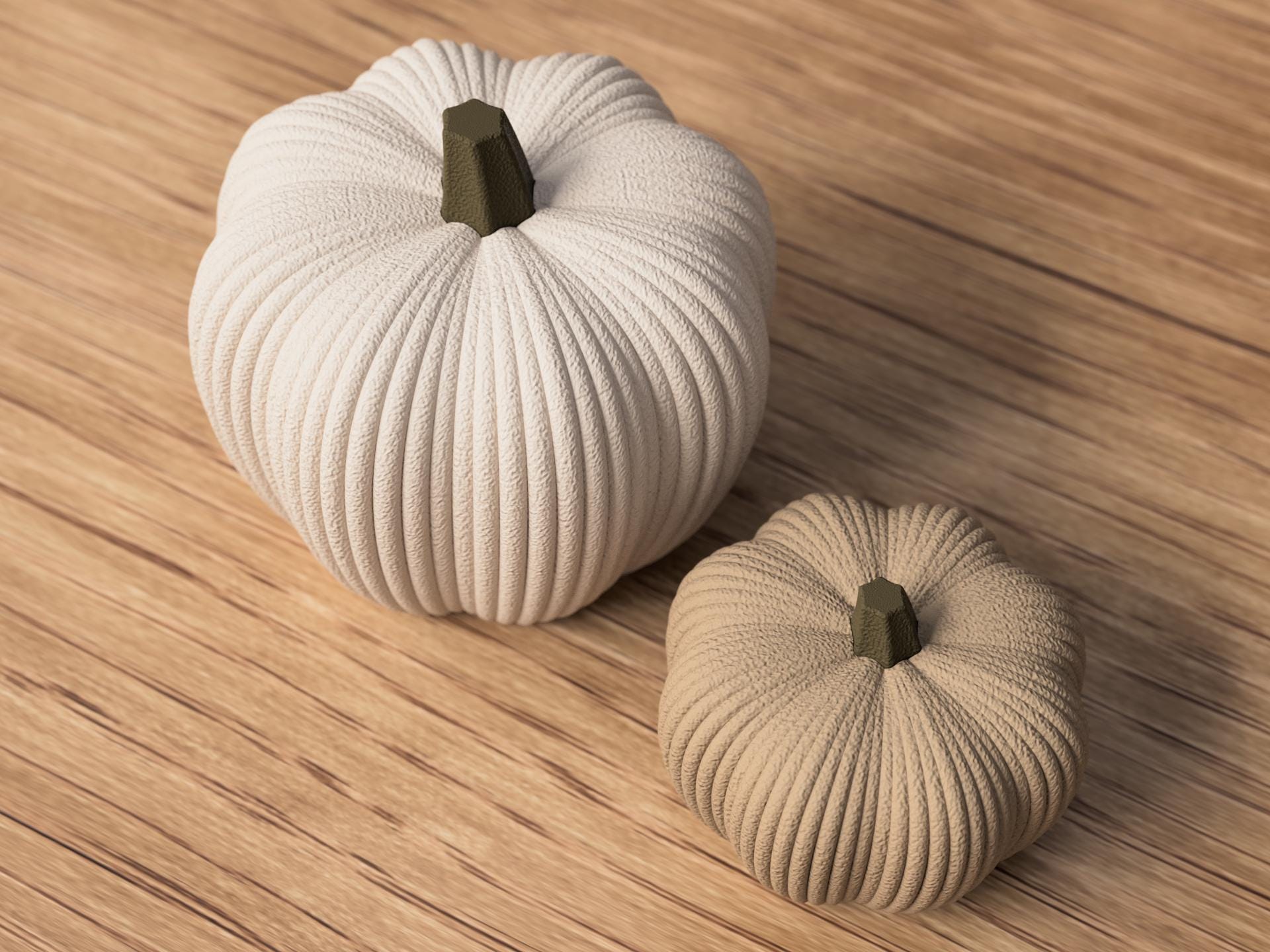 Two textured pumpkins on a wooden surface