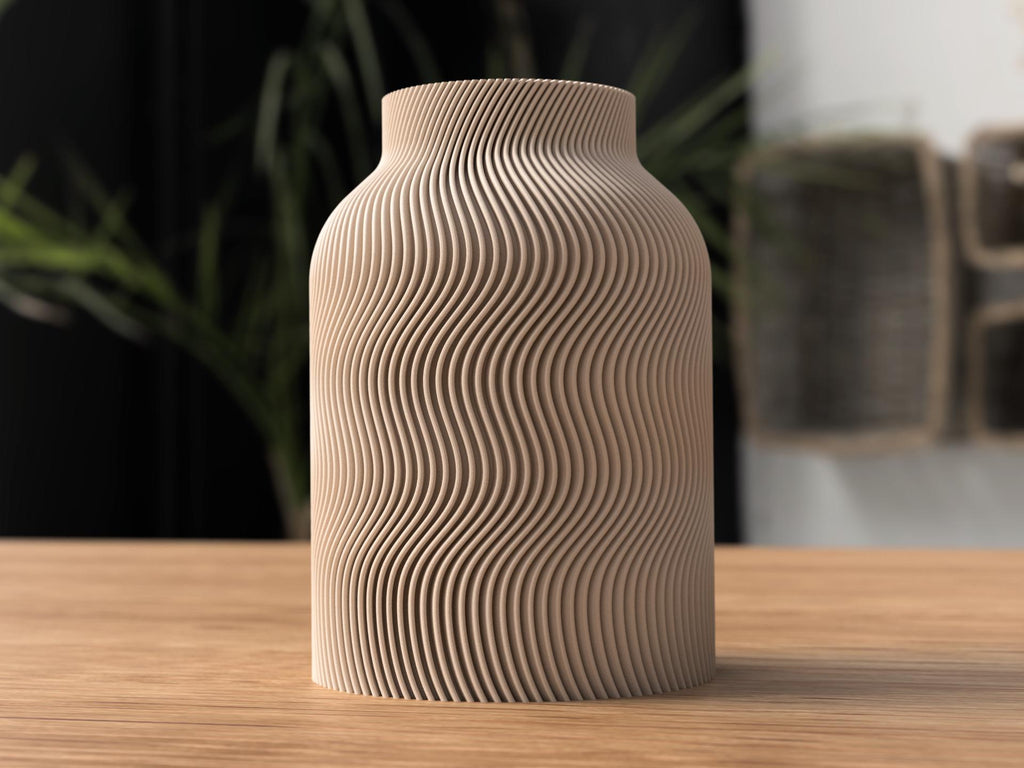 Beige textured vase on a wooden surface with a blurred indoor background