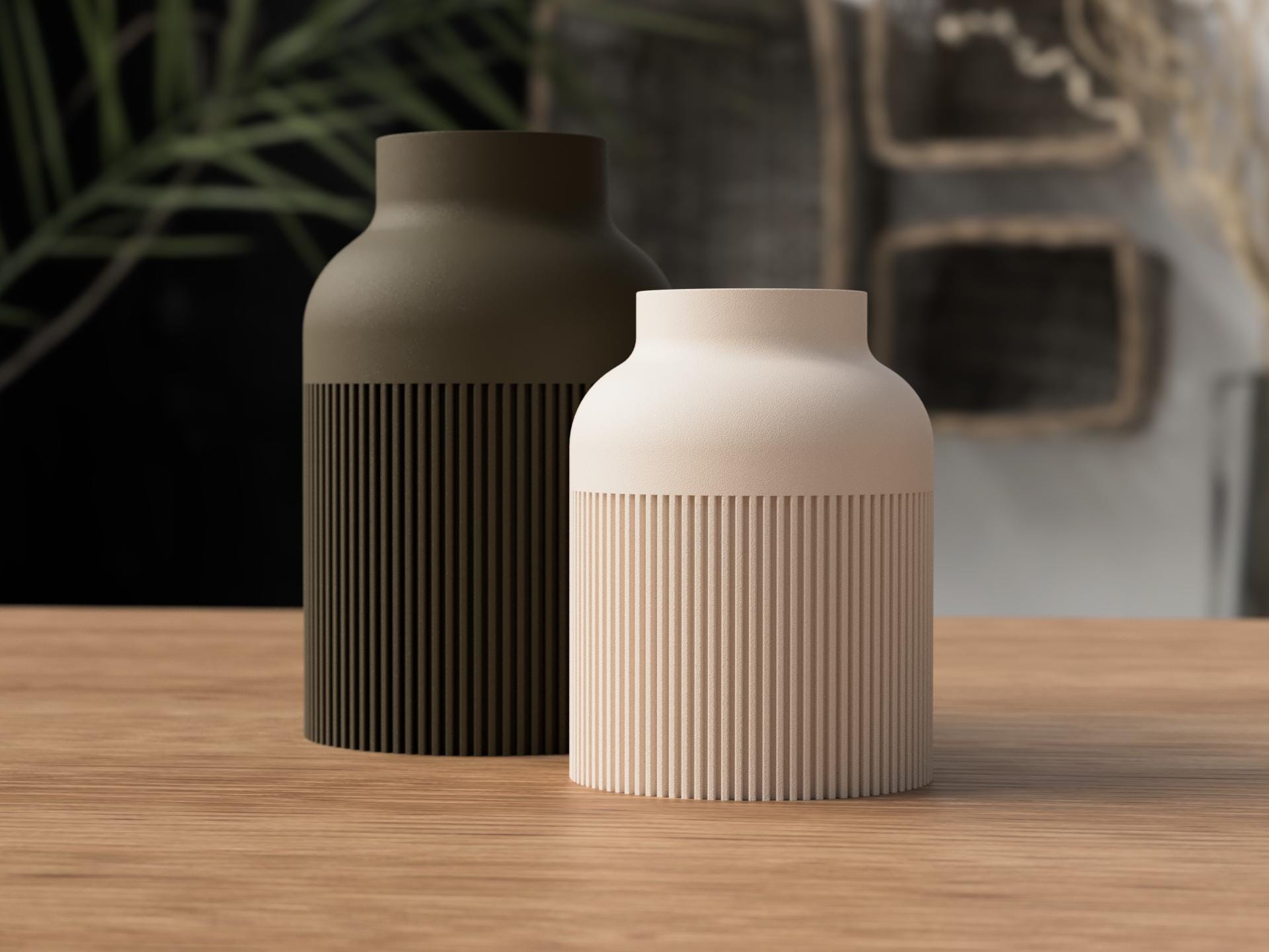 Two ceramic vases, one black and one beige, on a wooden surface with a blurred background.