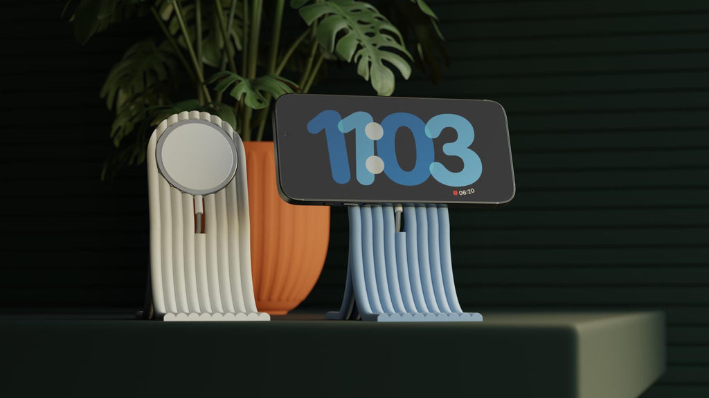 Digital clock with decorative stand on a dark background