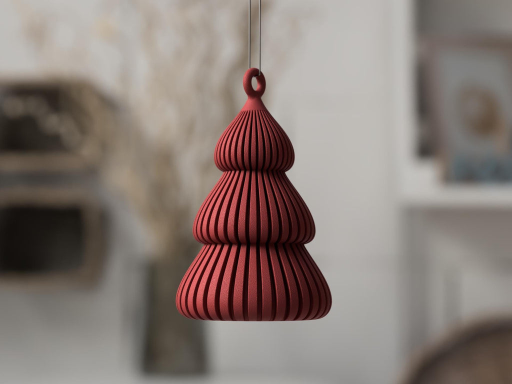 Red hanging decorative item against a blurred indoor background