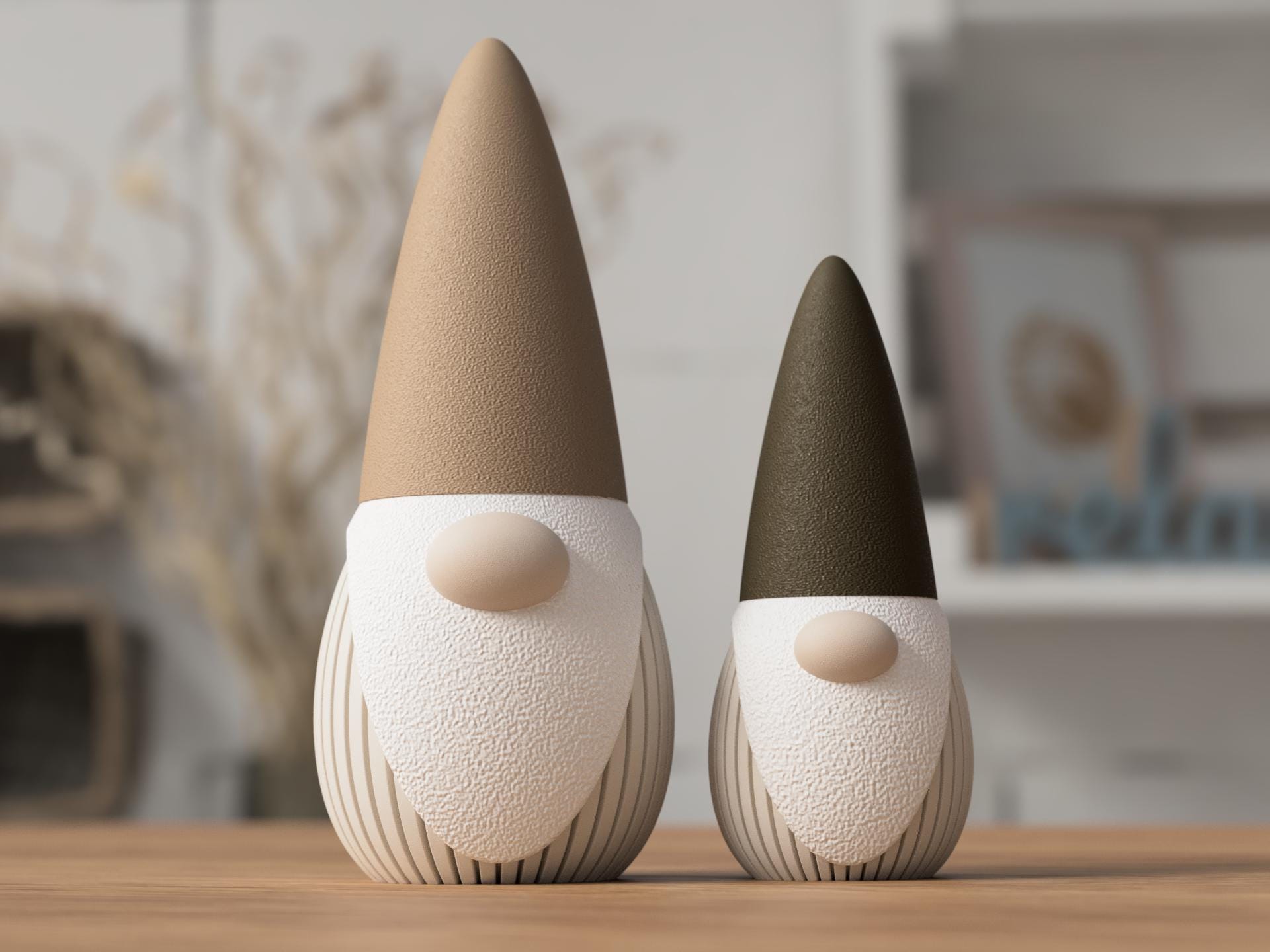 Two decorative gnomes with brown and black hats on a wooden surface.