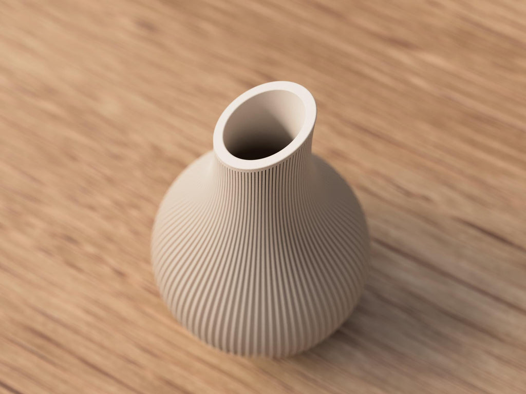 Beige textured vase on a wooden surface