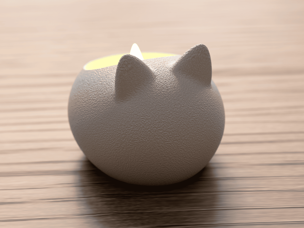 White cat-shaped night light on a wooden surface