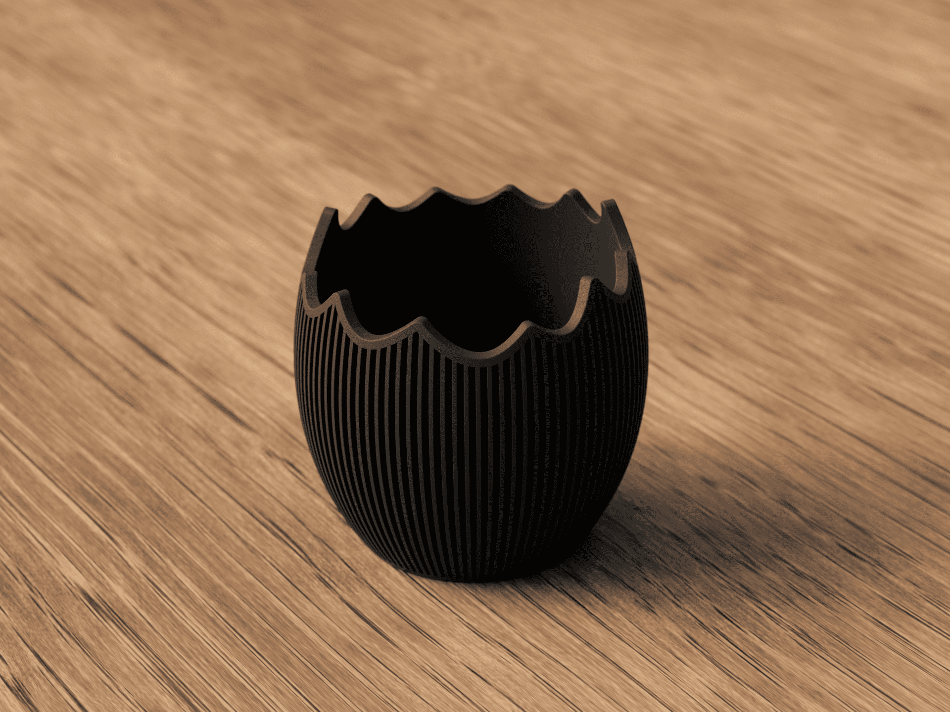 Black decorative object on a wooden surface