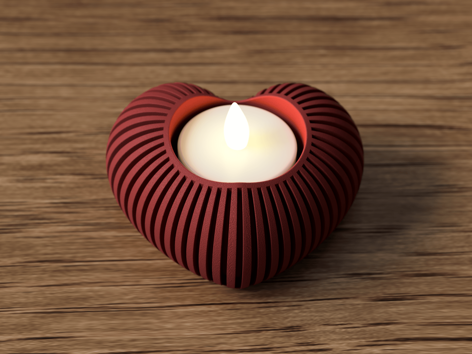 Heart-shaped red candle holder with a lit white candle on a wooden surface
