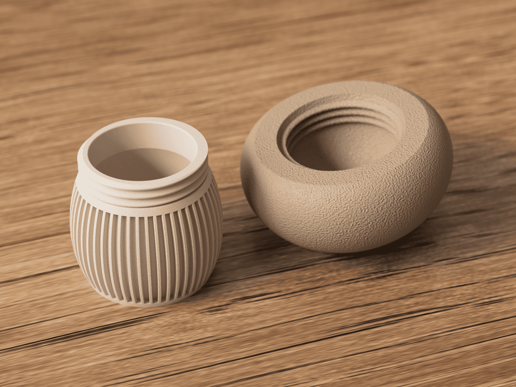 Two ceramic containers on a wooden surface