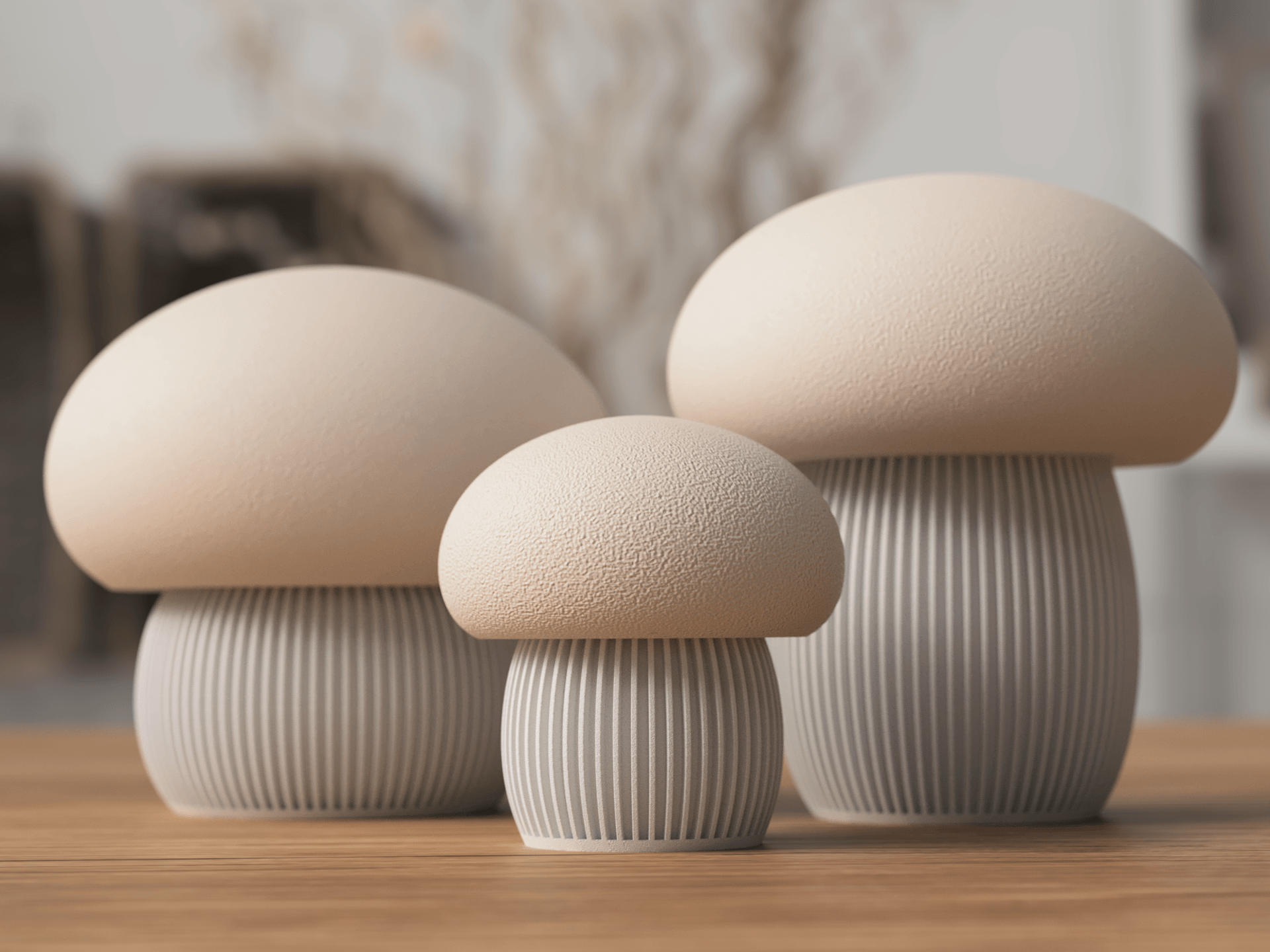 Three ceramic mushroom-shaped vases on a wooden surface with a blurred background