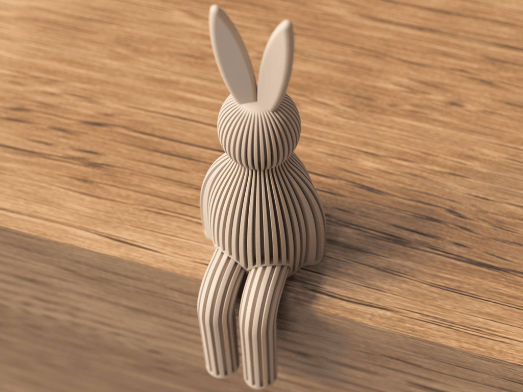 Wooden rabbit-shaped object on a wooden surface
