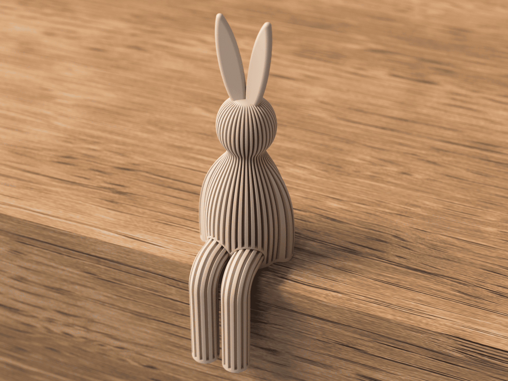 3D-printed rabbit sculpture on a wooden surface