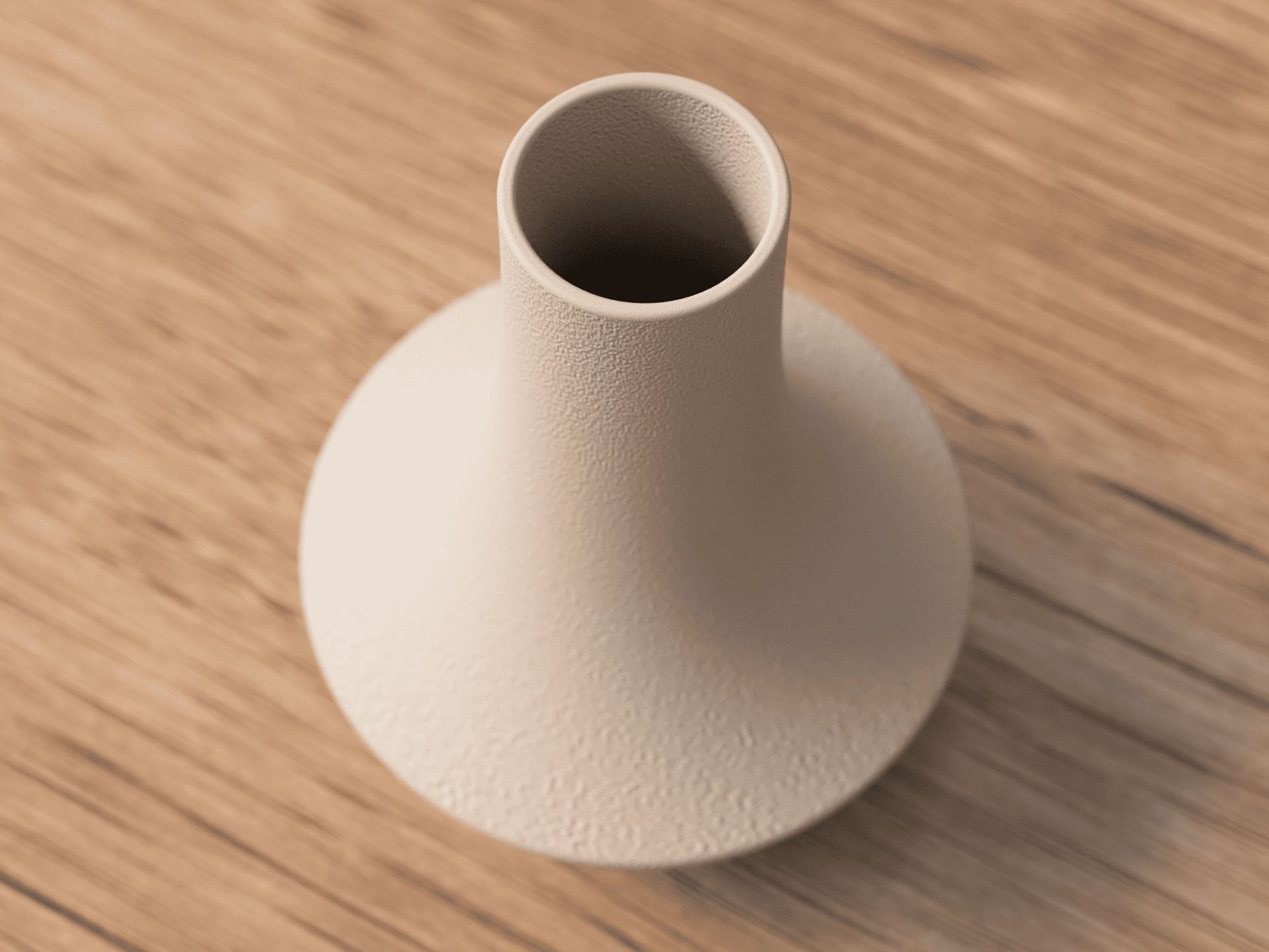 Beige textured vase on a wooden surface