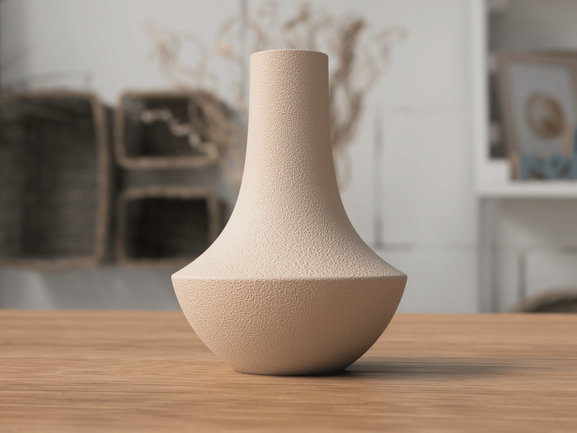 Beige textured vase on a wooden surface with a blurred indoor background