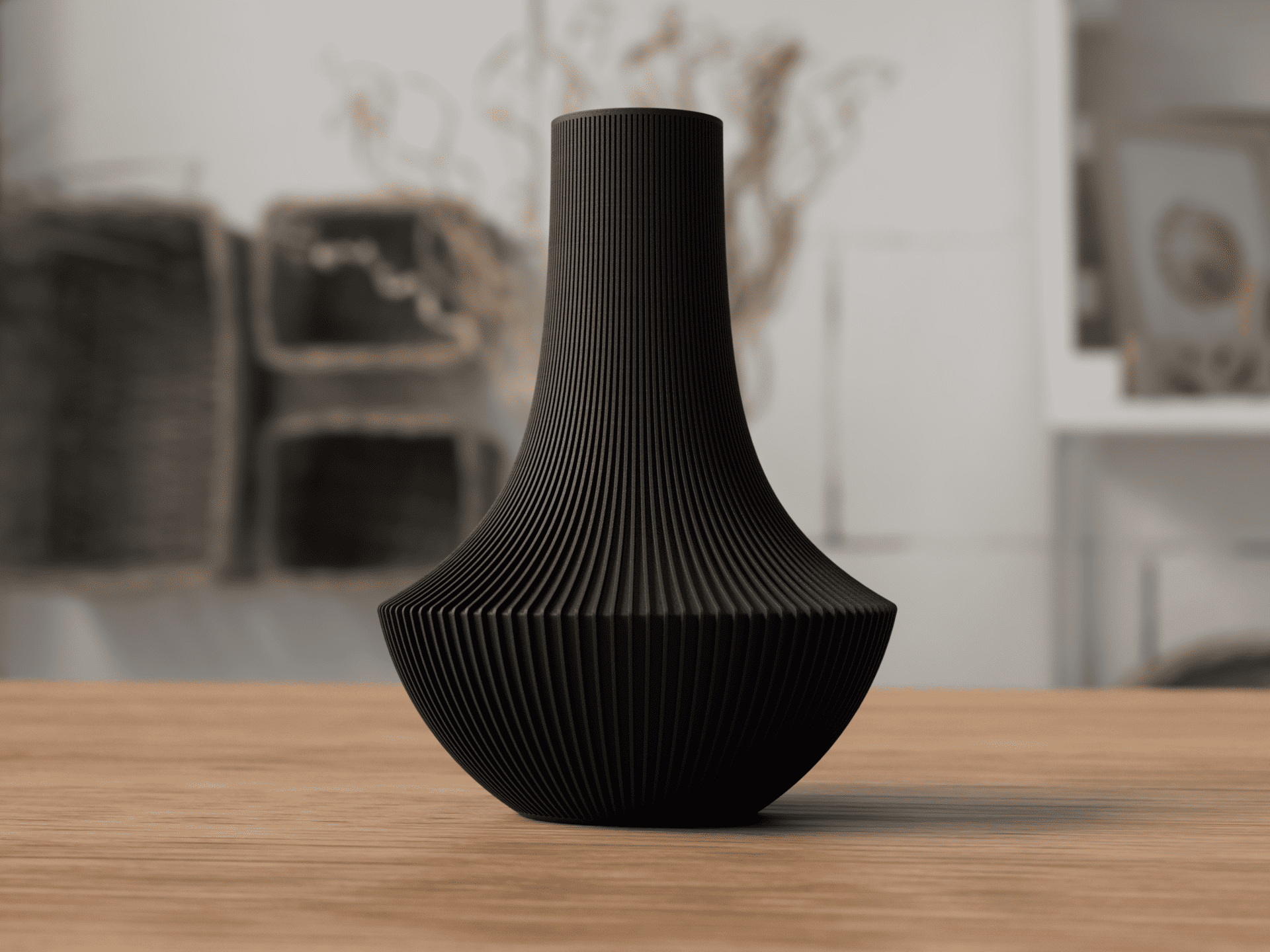 Black textured vase on a wooden surface with a blurred indoor background