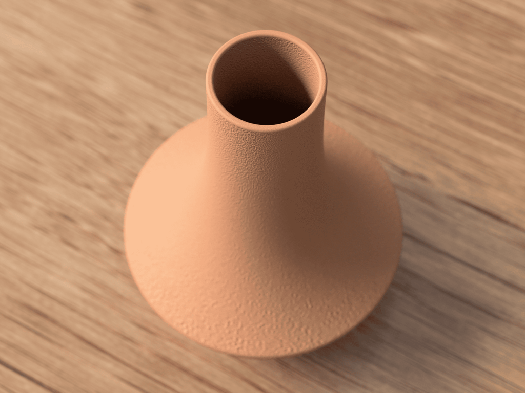 Terracotta-colored vase on a wooden surface