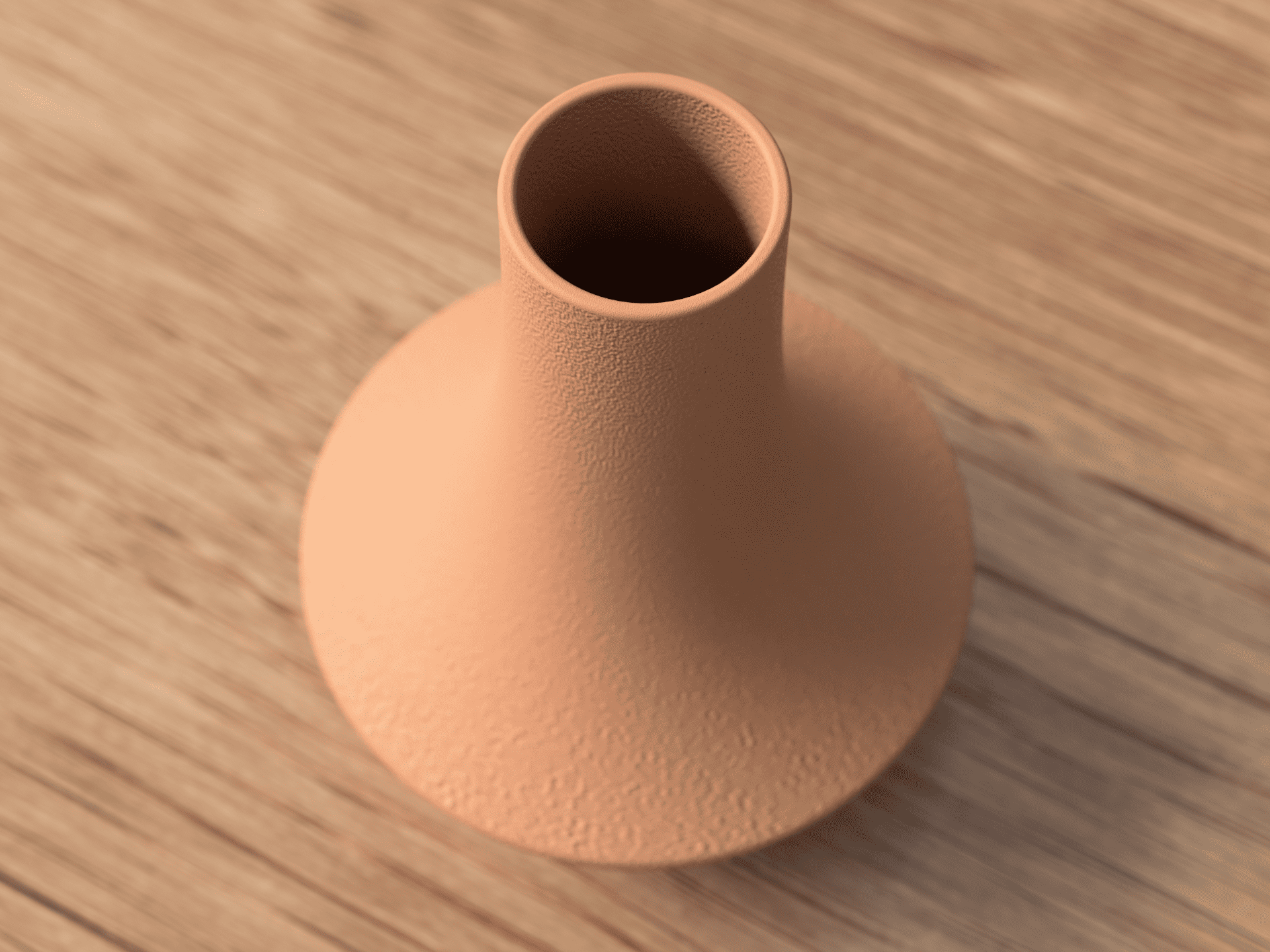 Terracotta-colored vase on a wooden surface
