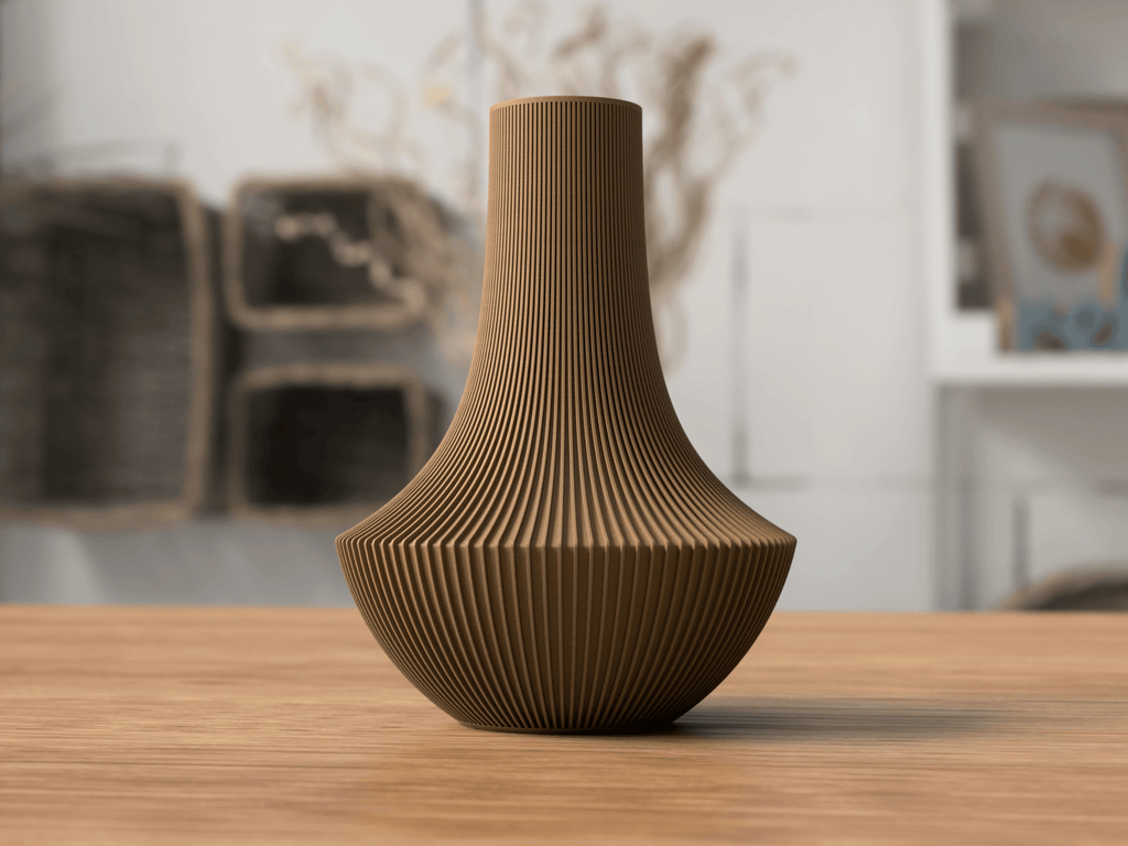 Brown textured vase on a wooden surface with a blurred indoor background