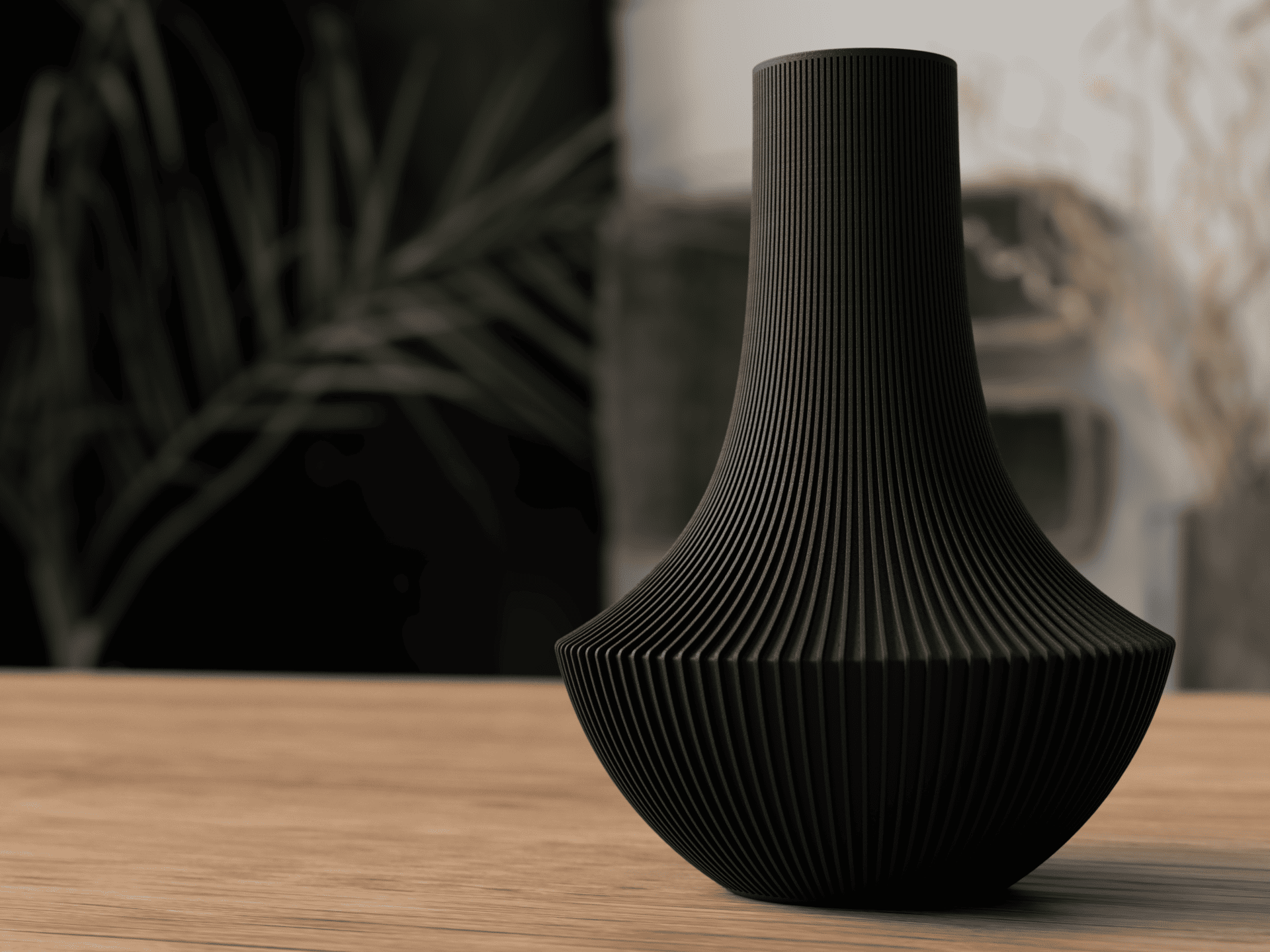 Black textured vase on a wooden surface with a blurred background