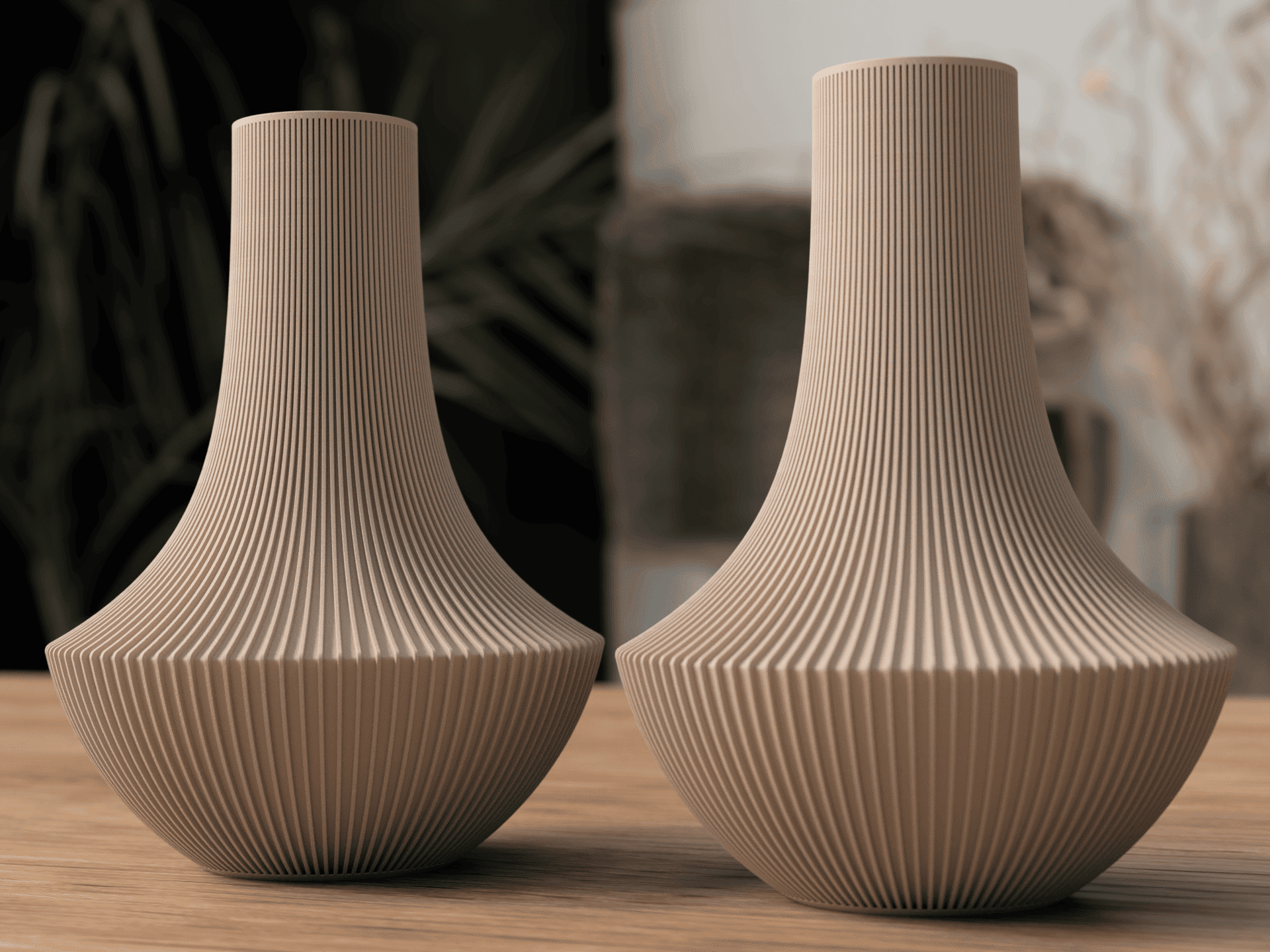 Two beige textured vases on a wooden surface with a blurred background
