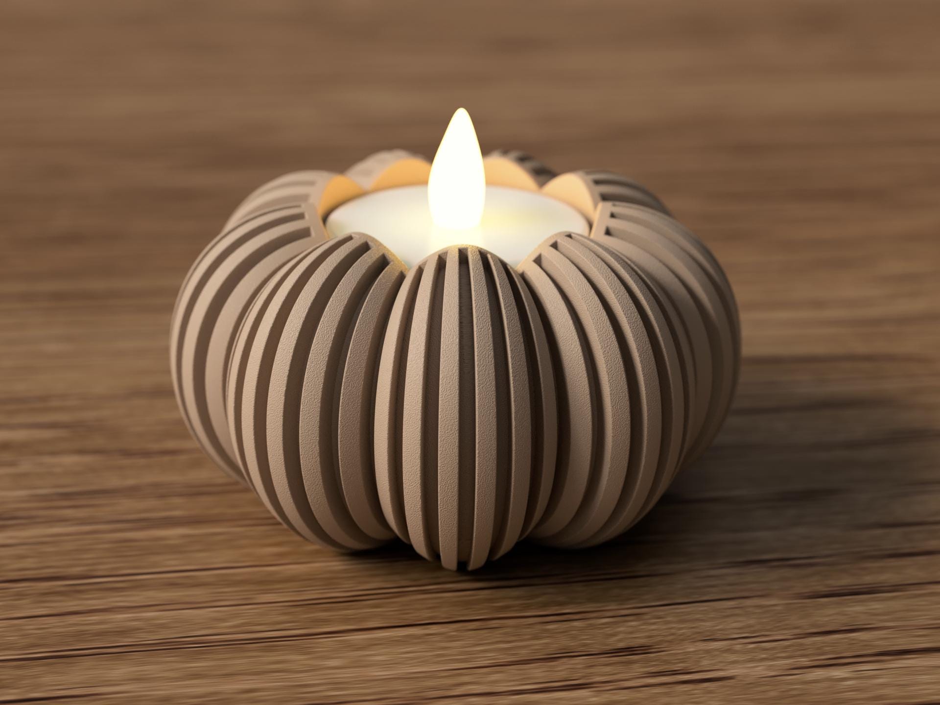 Candle in a decorative striped holder on a wooden surface