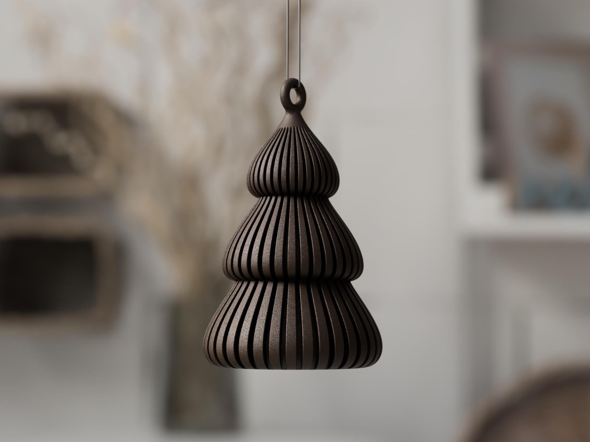 Decorative black hanging sculpture against a blurred indoor background