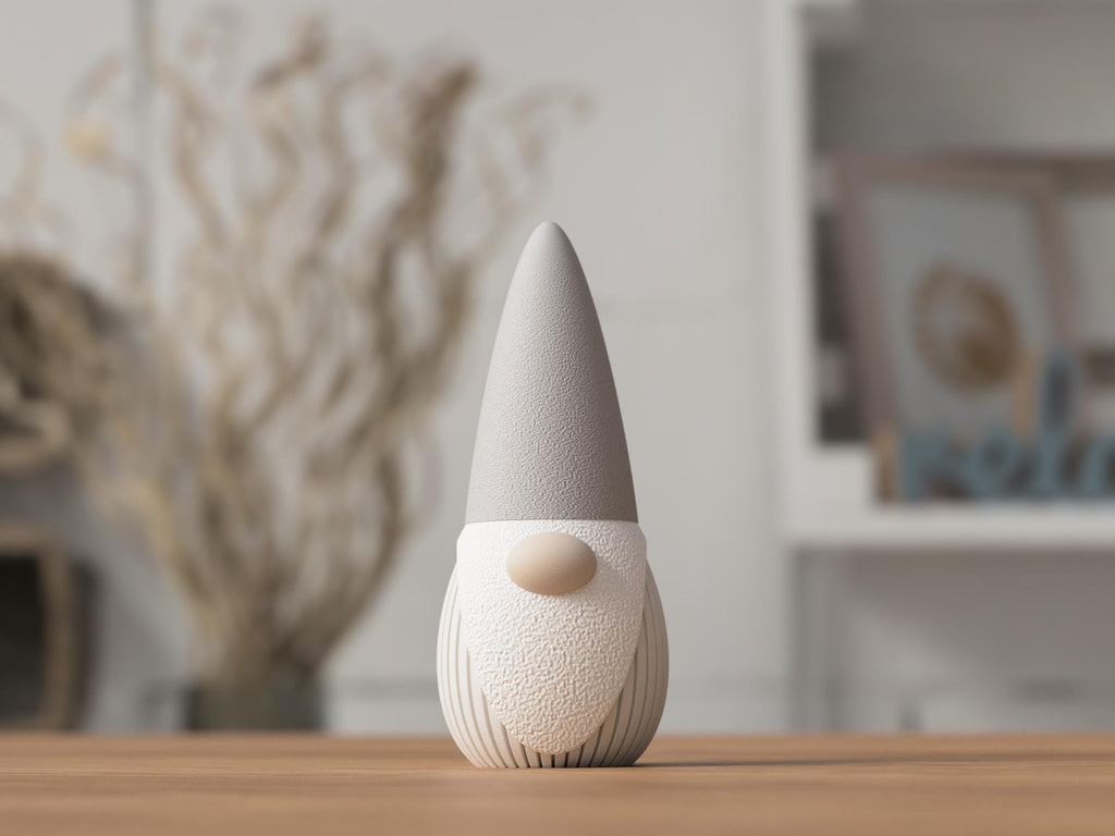 Decorative gnome figure on a wooden surface with a blurred indoor background