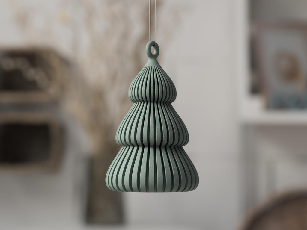 Green textured pendant light hanging against a blurred indoor background
