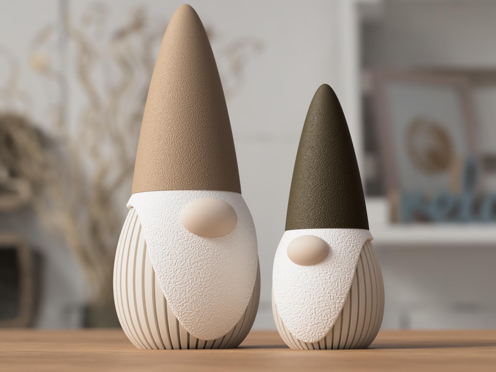 Two decorative gnomes with brown and black hats on a wooden surface.