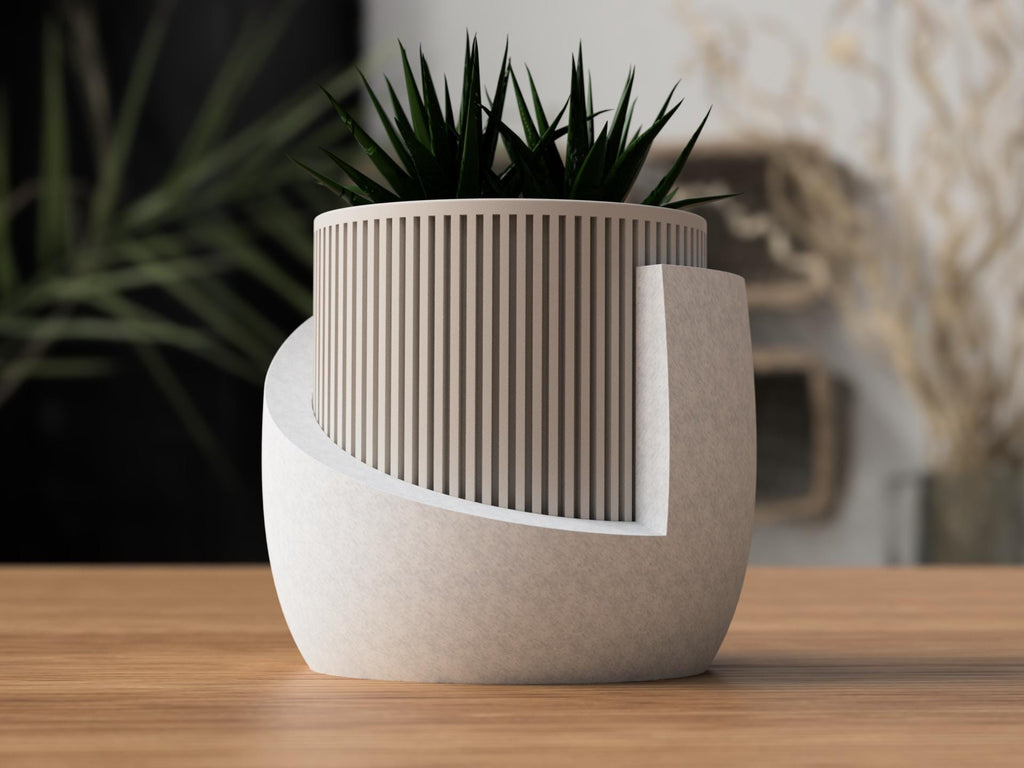 Modern beige planter with geometric design on a wooden surface